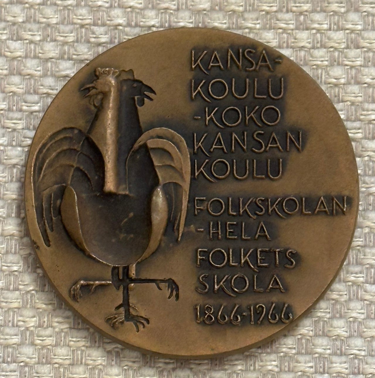 kansakoulu-100v-muistomitali-tori