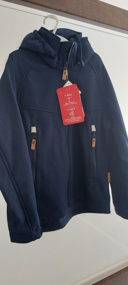 Uusi reima softshelltakki 122cm