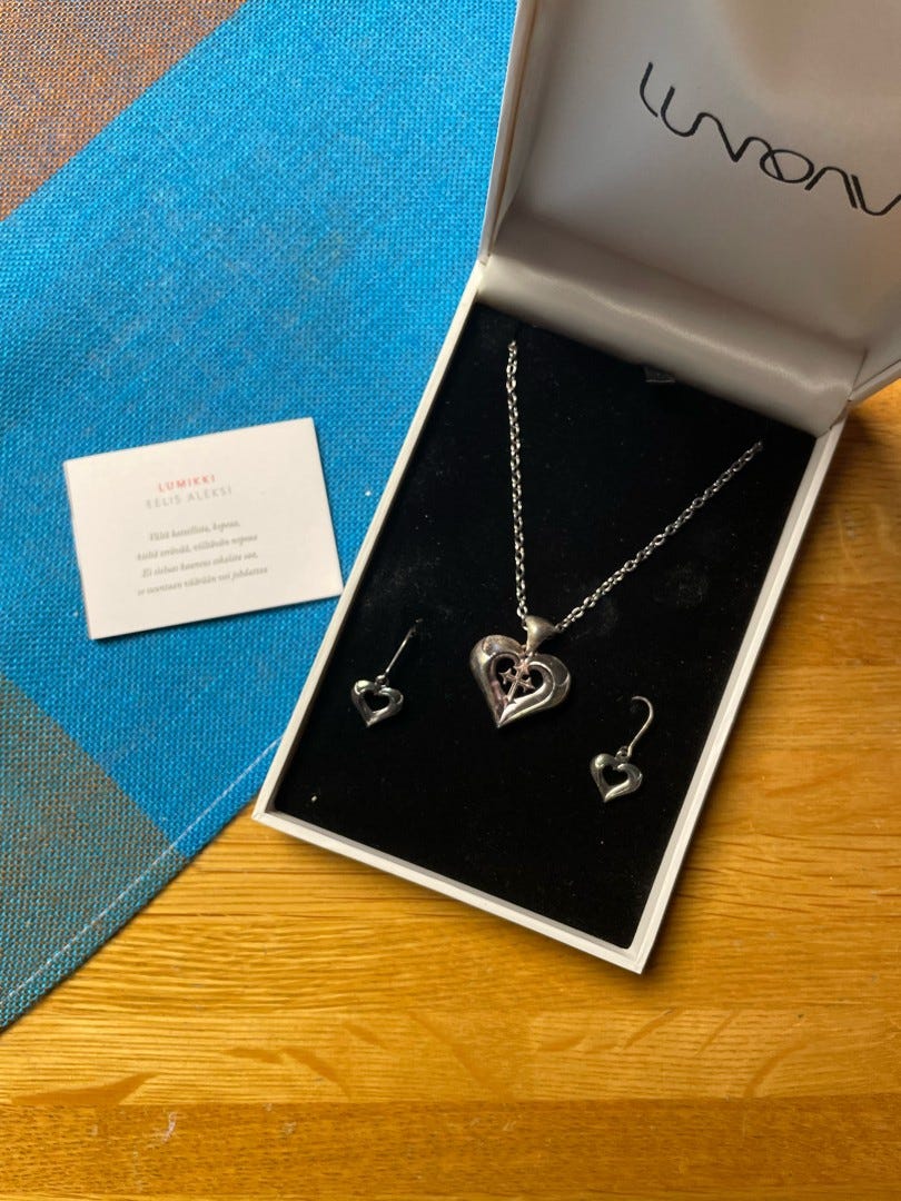 Handcrafted silver Lumikki pendant and earrings by Eelis Aleksi