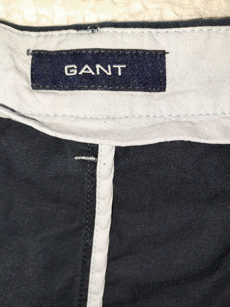 miesten housut , GANT Chinos tummansininen W46/L34