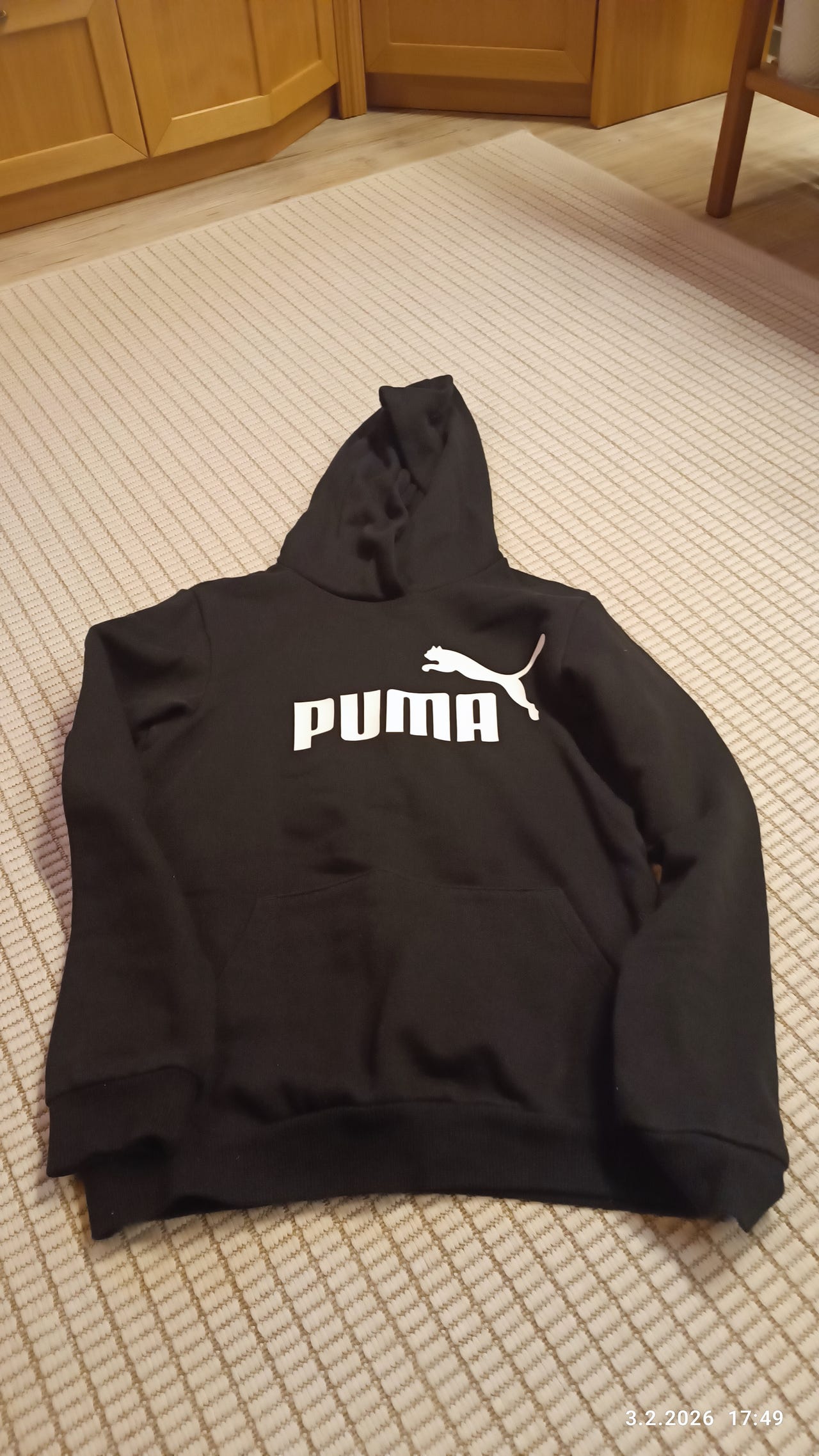 164 musta Puma huppari