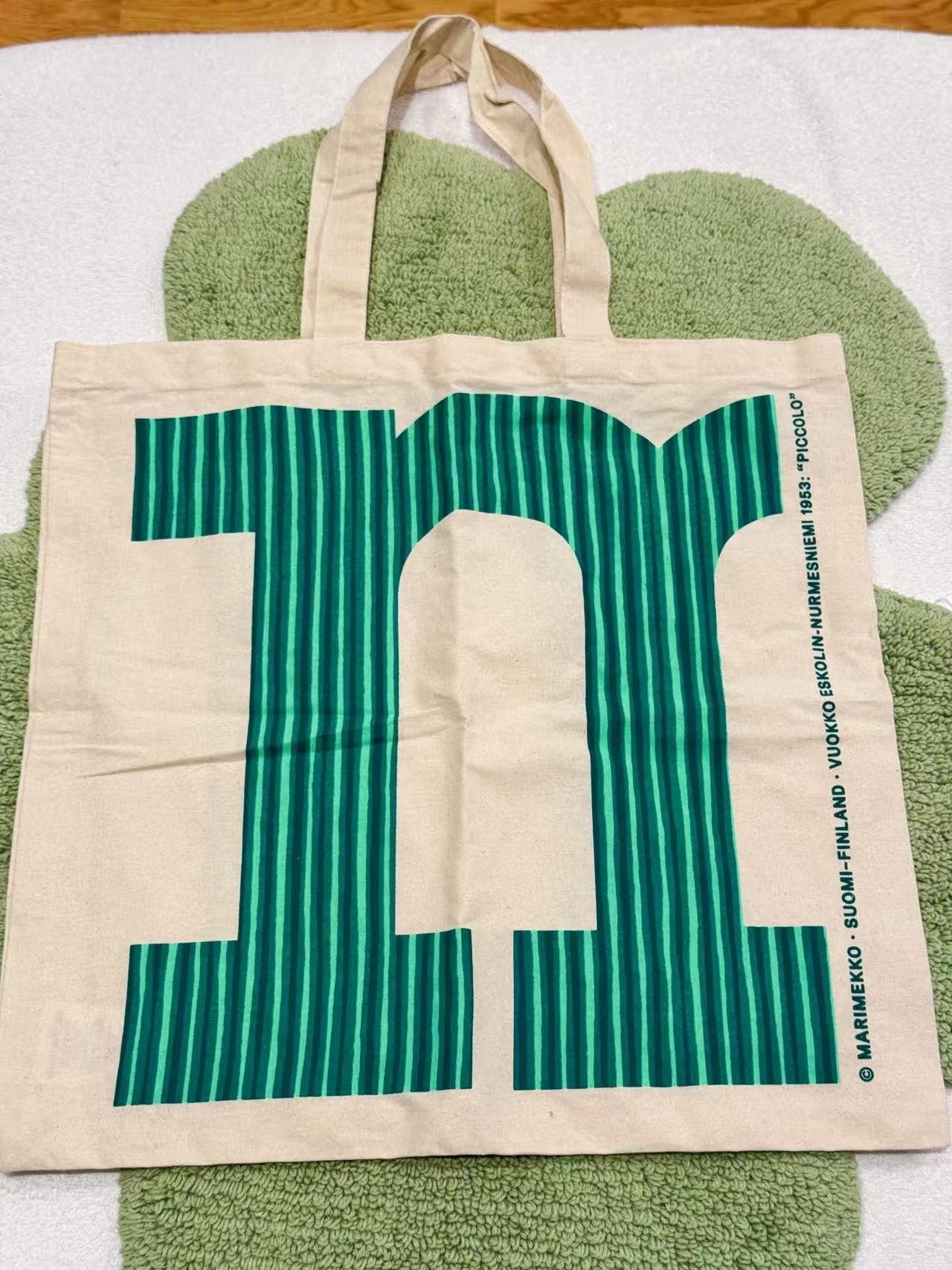 Marimekko Piccolo logokassi Limited edition luonnonvalkoinen vihr