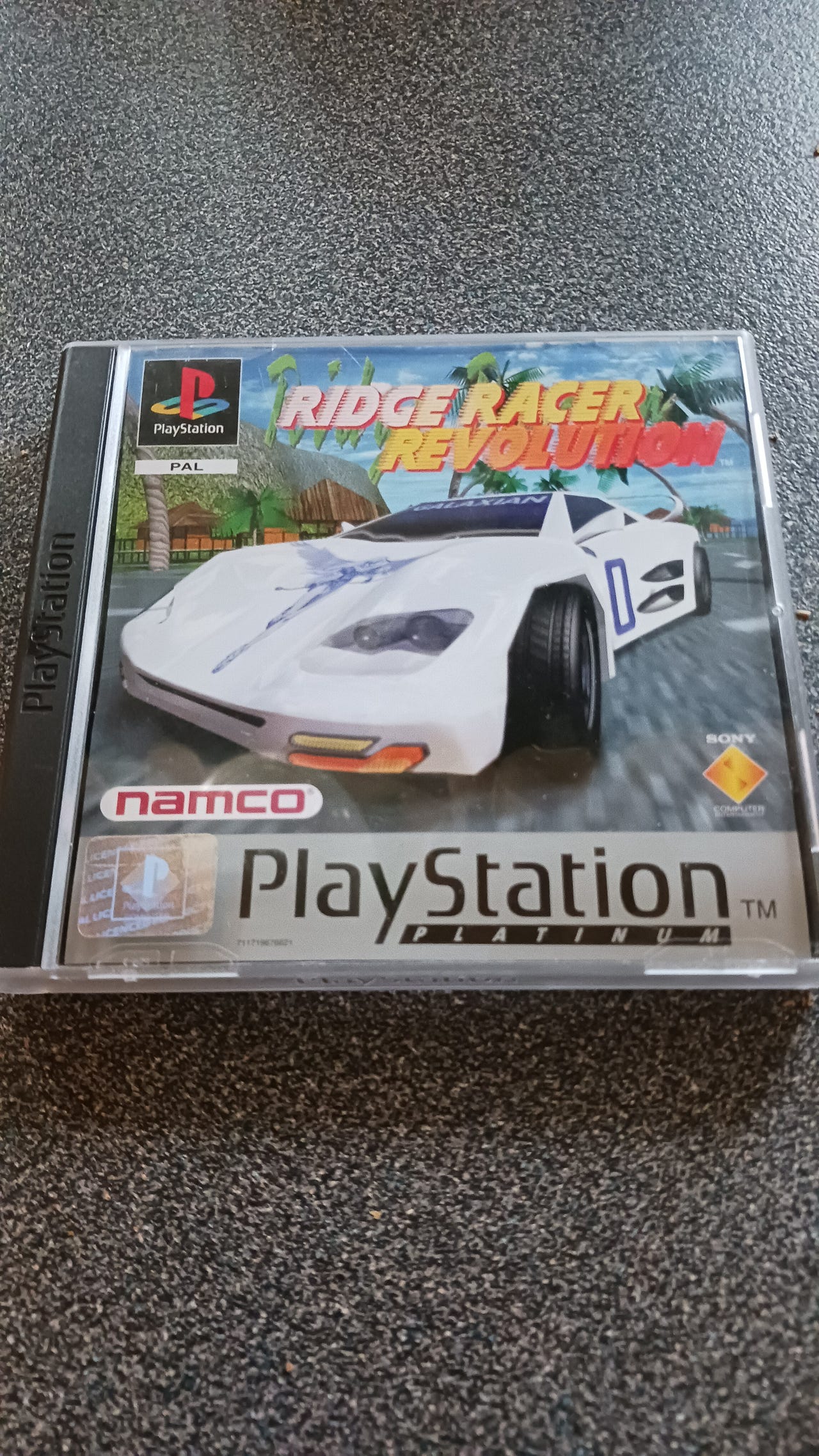 PS1 / Sony Playstation 1 - Ridge Racer Revolution JAPAN mit OVP OVP beschädigt