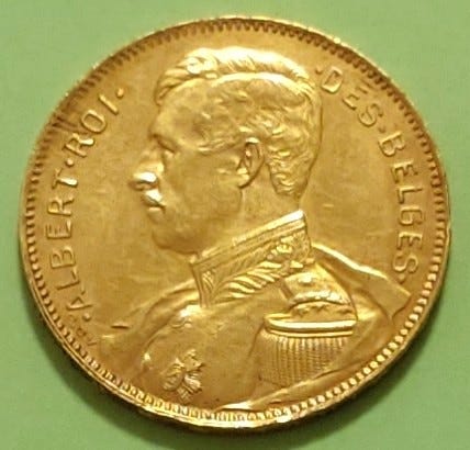 KESÄTARJOUS. Belgia 20 Francs 1914 kulta raha. Univormu.