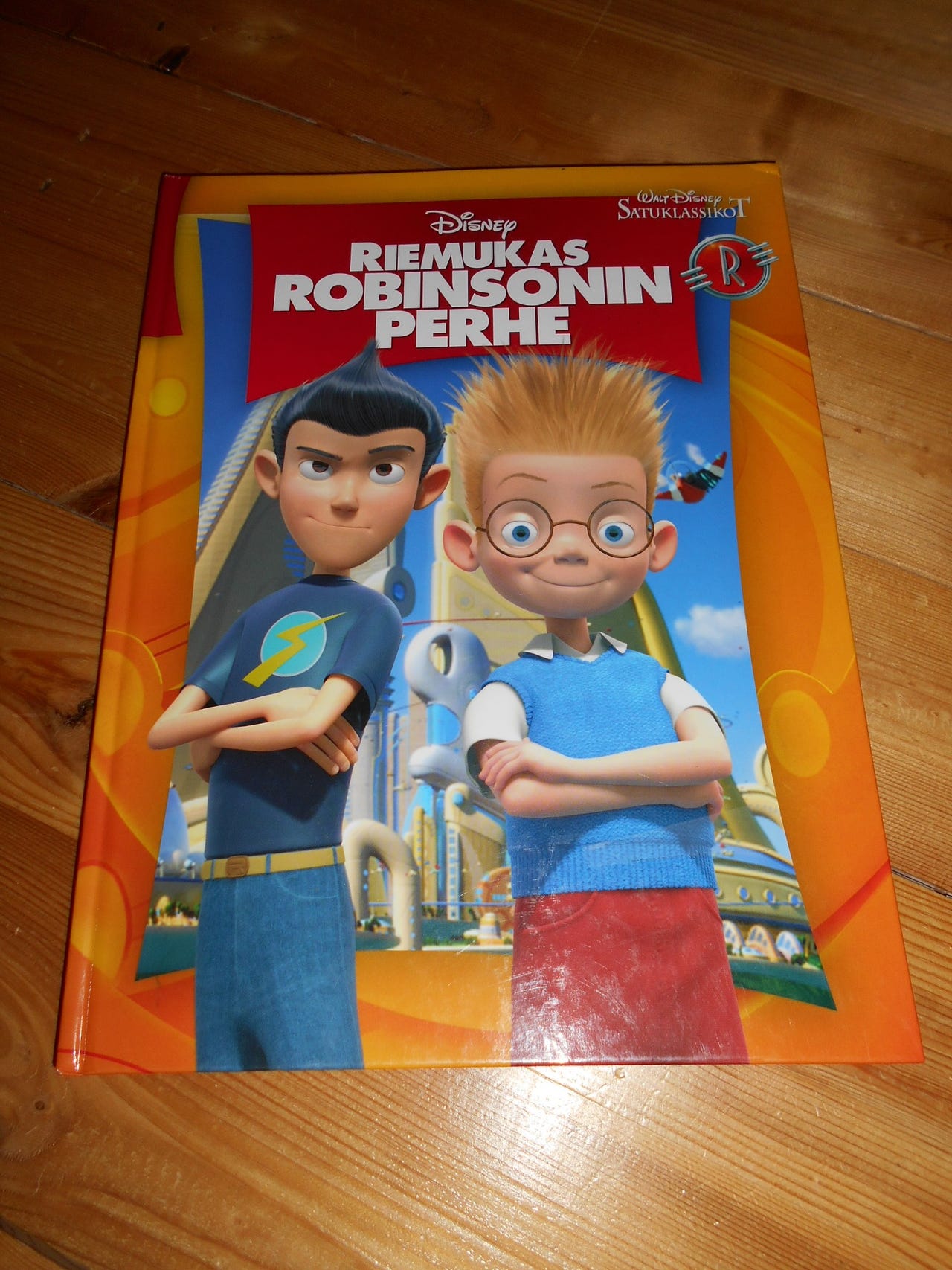 Riemukas Robinsonin perhe-kirja