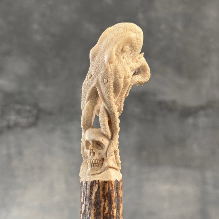 Kaiverrus, Beautiful Octopus and Human Skull carving from a deer