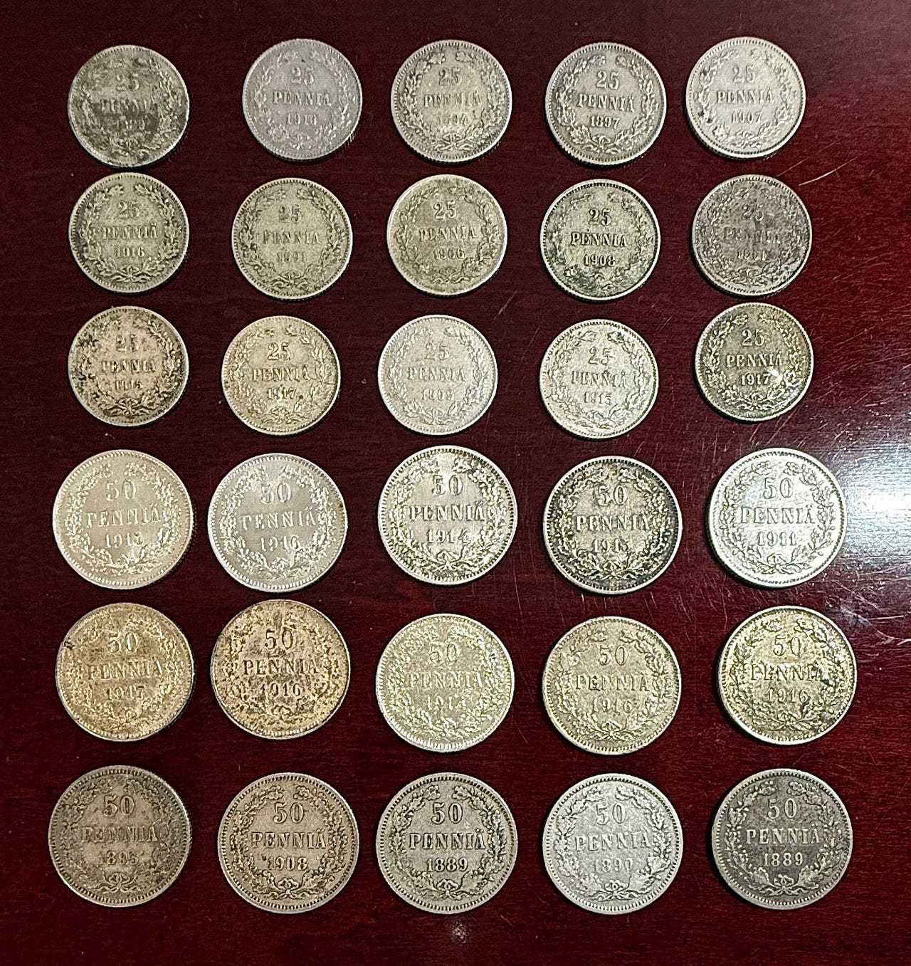 30 kpl 50 ja 25 hopea pennejä 1800 ja 1900 luvulta