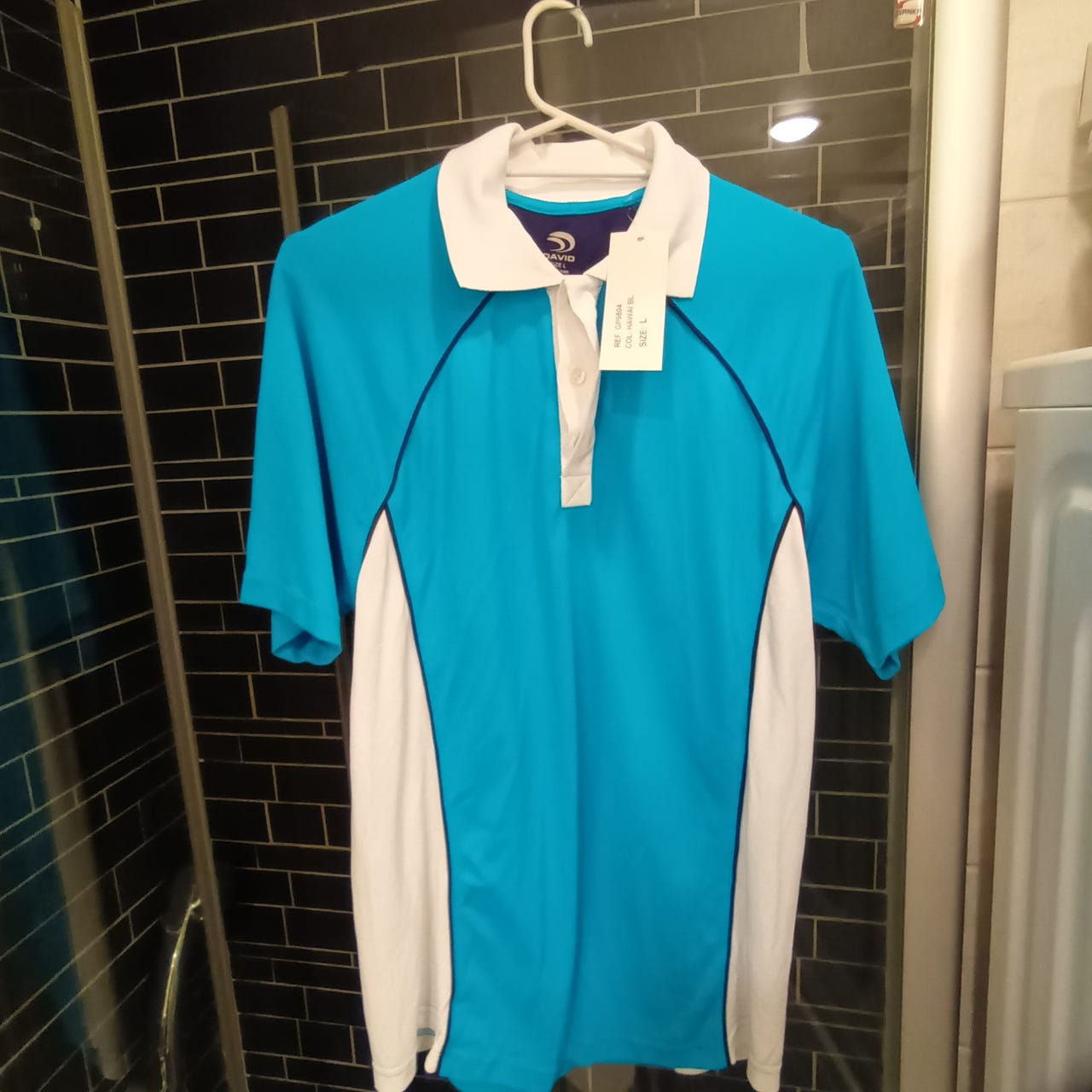 Kuvan mukainen käyttämätön golf t-paita koko L