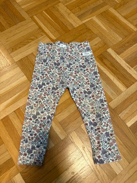 Newbie kukkahousut koko 80