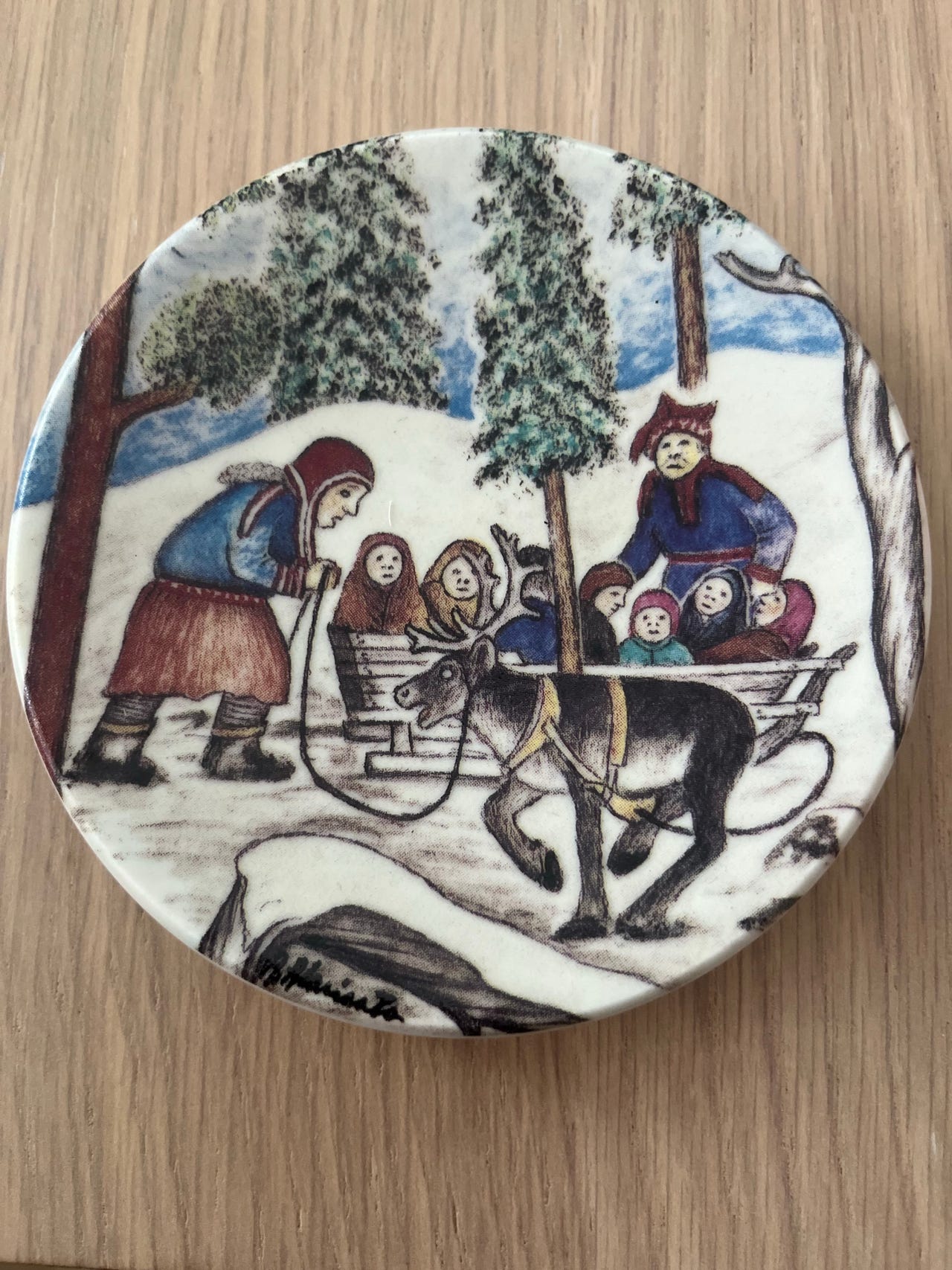 Arabia Lappalaiset ajanvietepuuhissa seinälautanen 1986
