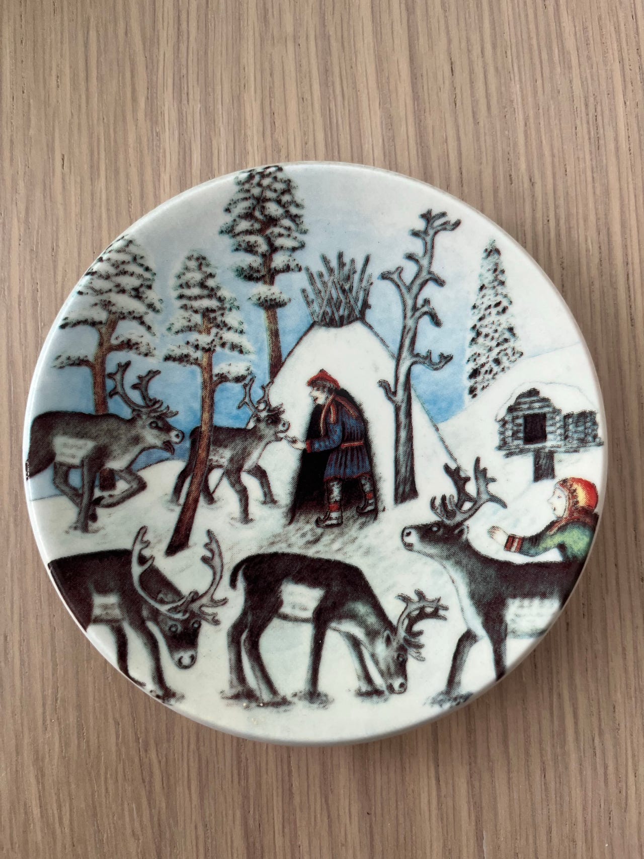 Arabia Poromies talvella seinälautanen 1982
