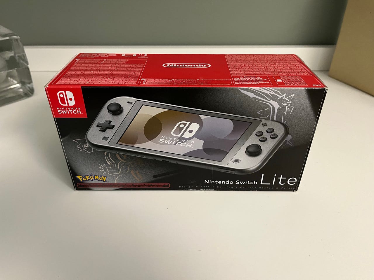 Nintendo Switch Lite Pokémon Dialga & Palkia -pelikonsoli harmaa