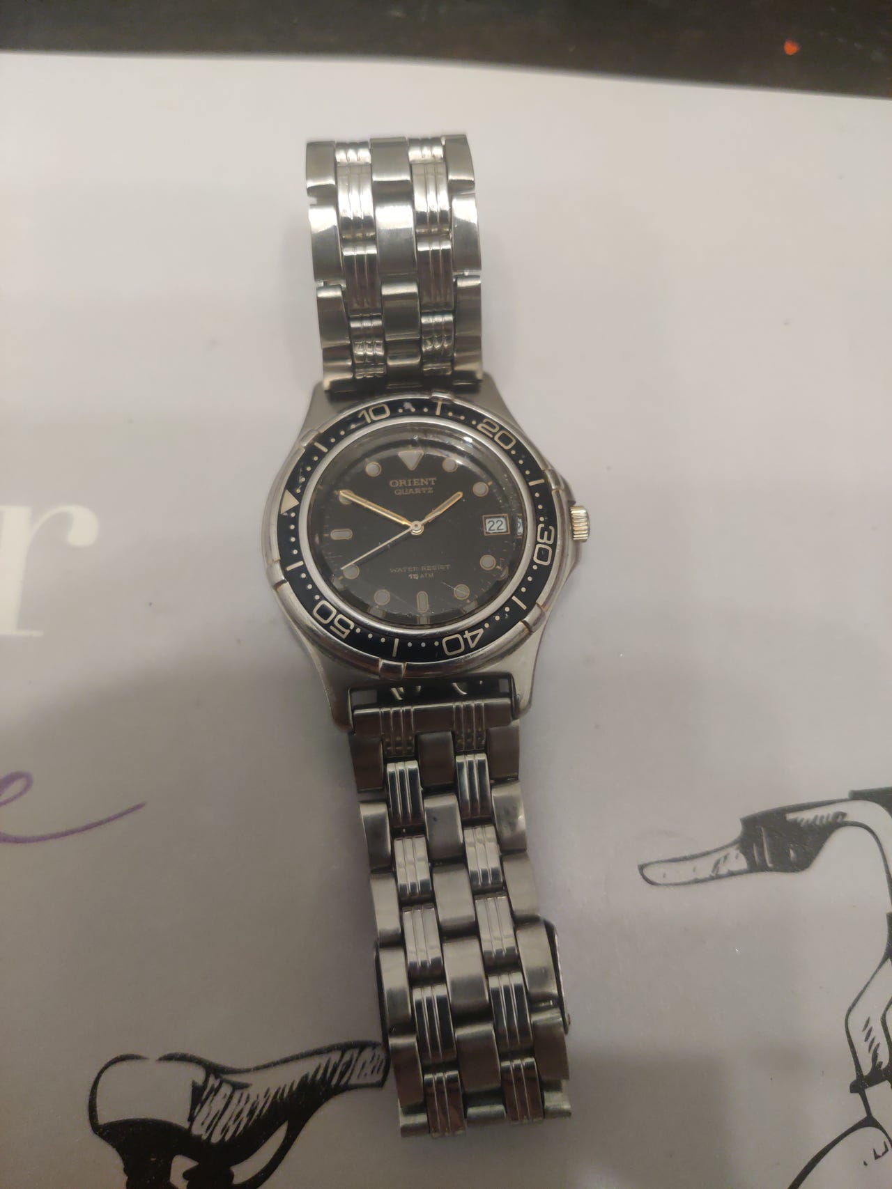 Orient vintage miesten rannekello teräsrannekkeella