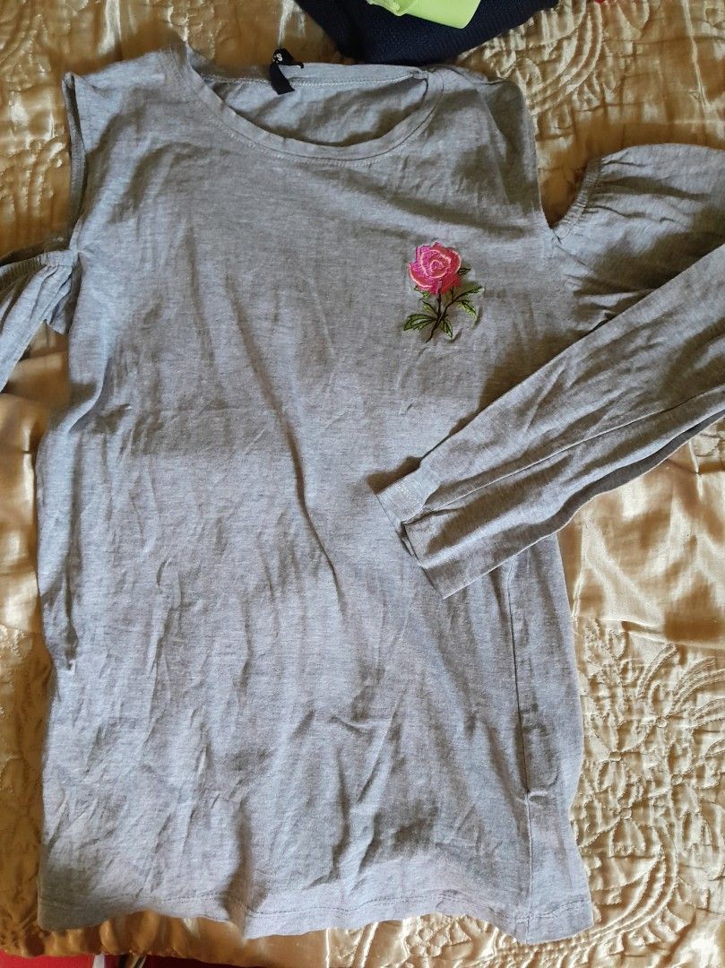 Uudenveroinen paita, jossa ruusun kuva S