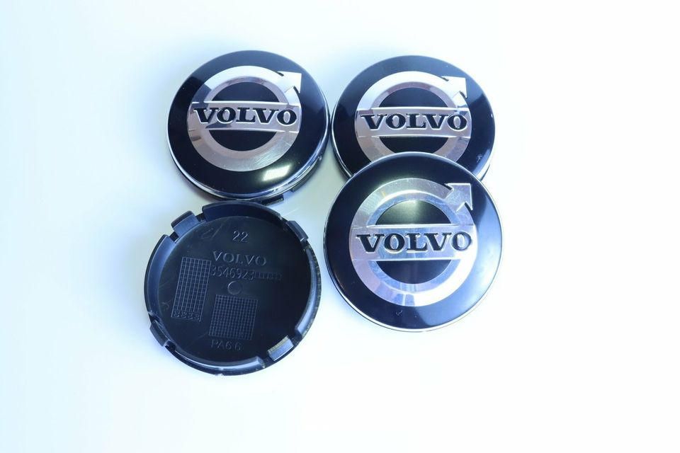 Volvo Kromi-Mustat Vannekeskiöt 64mm ; Uusi tyyli
