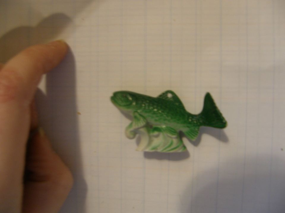 Vihreä kala-hahmo
