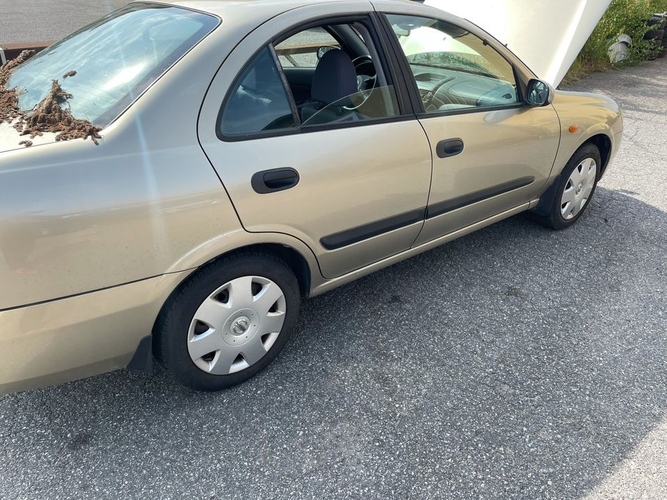 Nissan almera 1.8 -03 sedan osina