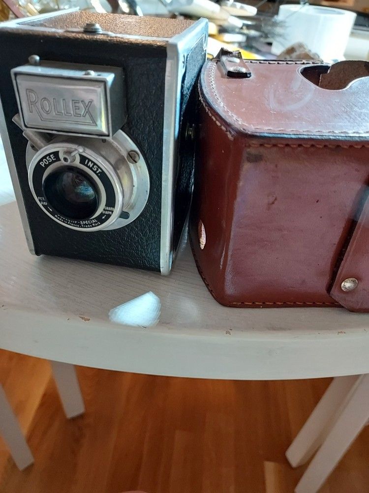 Rollex kamera ja laukku