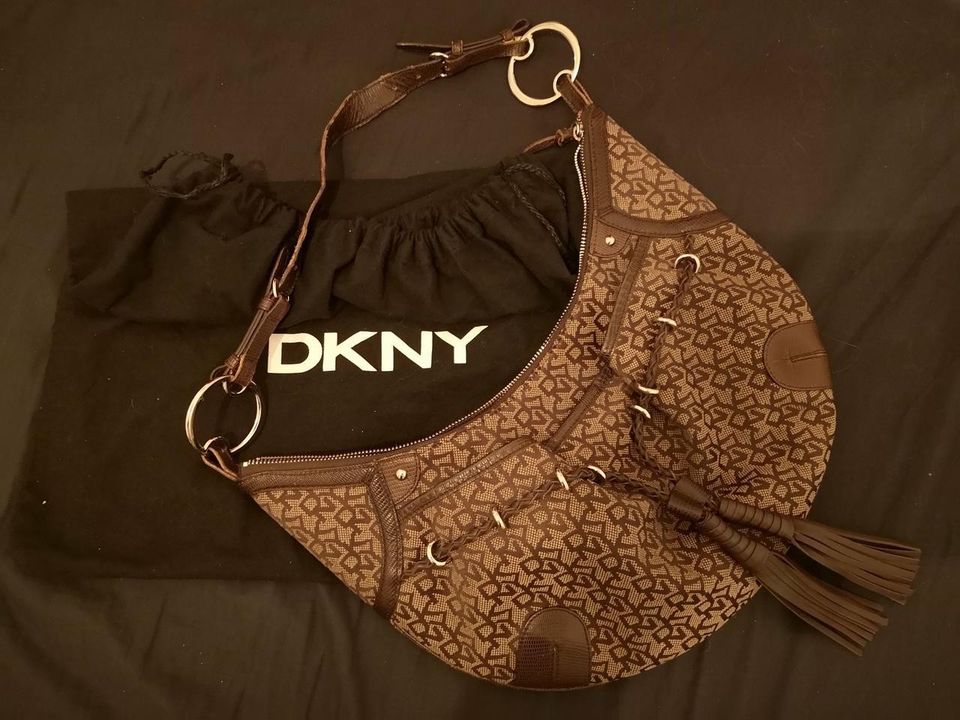 DKNY ruskea käsilaukku. (aito)