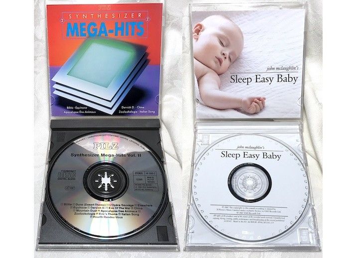 CD - levyt ( Mega-Hits + Sleep Easy Baby ) 2 levyä