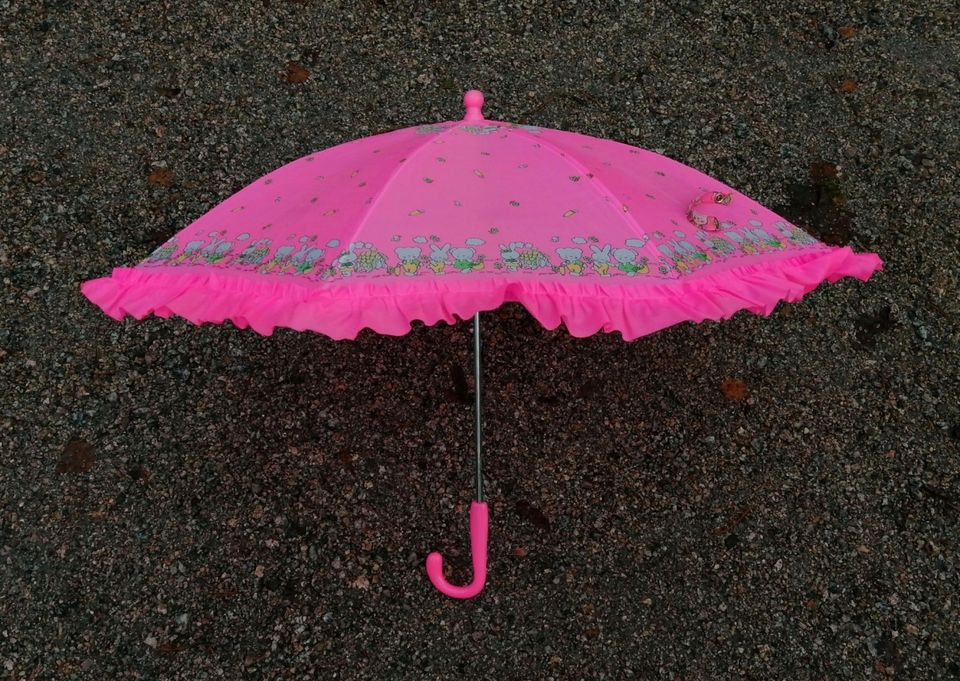 Pinkki lasten sateenvarjo