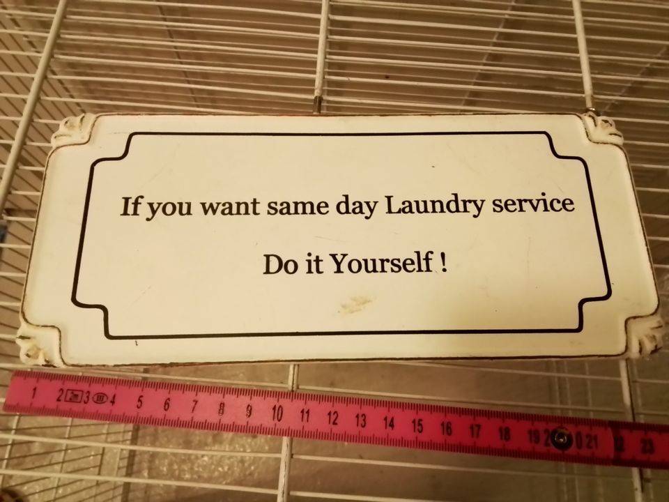 Laundryservise kyltti