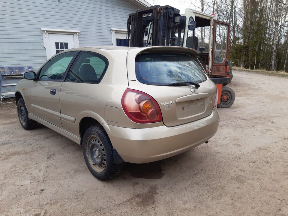 Nissan almera 1,8 -04