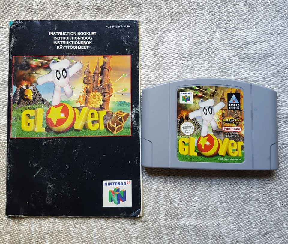 N64 peli Glover ja ohjekirjanen