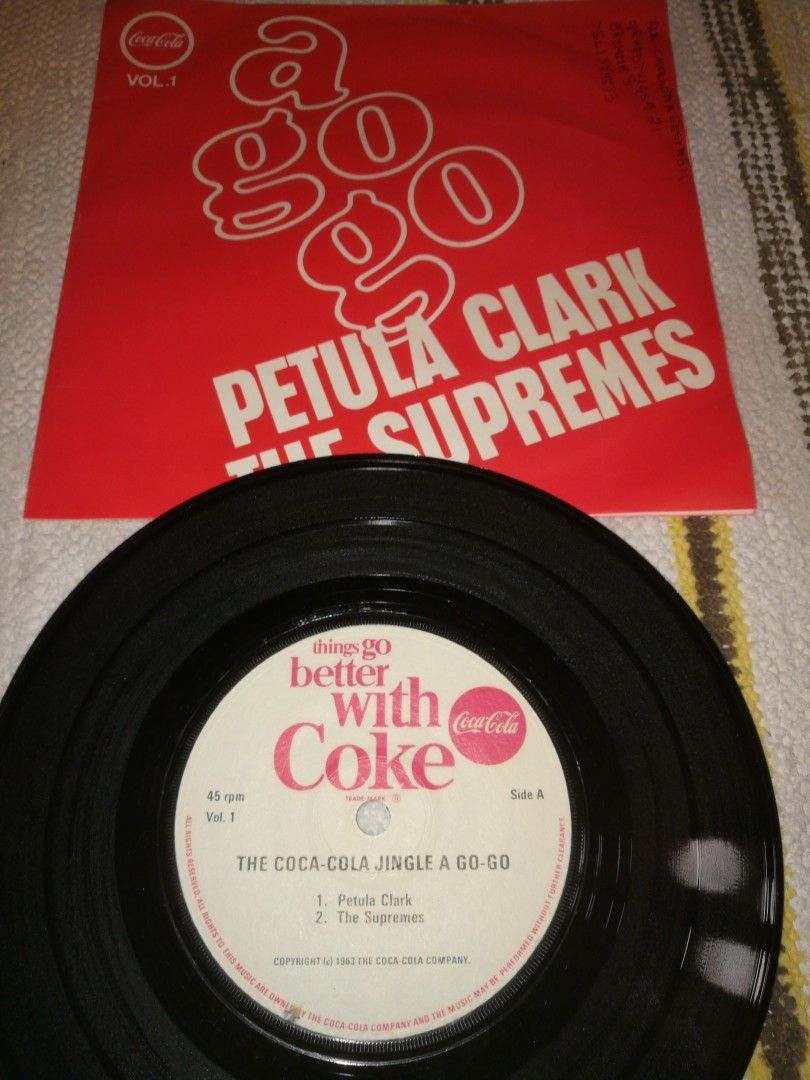 The Coca-Cola jingle a go-go 7" Single