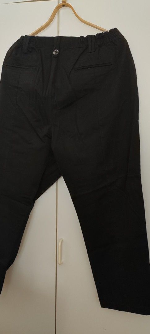 Uusi musta kangas housut, koko 52-54