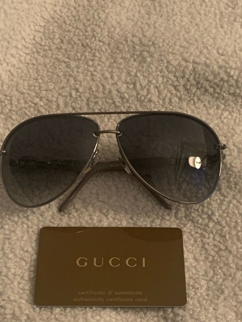 Gucci Aurinkolasit