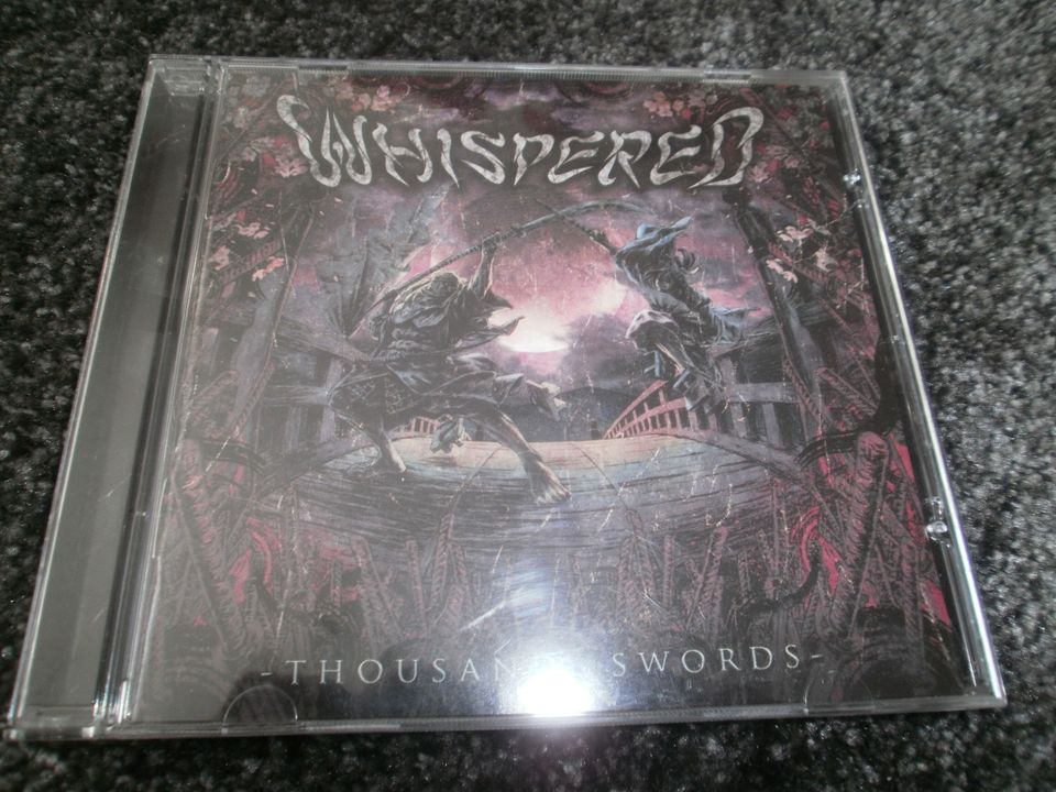 Whispered: Thousand Swords cd