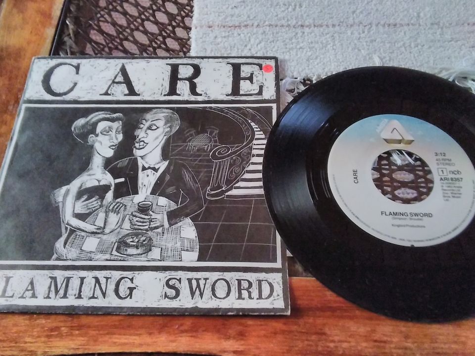 Care 7" Flaming sword / Misericorde