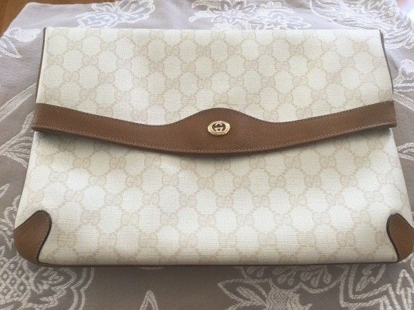 Gucci luonnonvalko-ruskea clutch-mallinen laukku