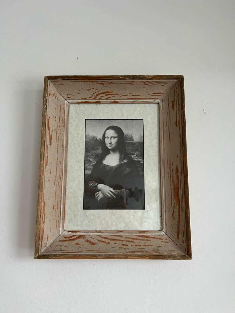 Mona Lisa kuva vanhoissa kehyksissä