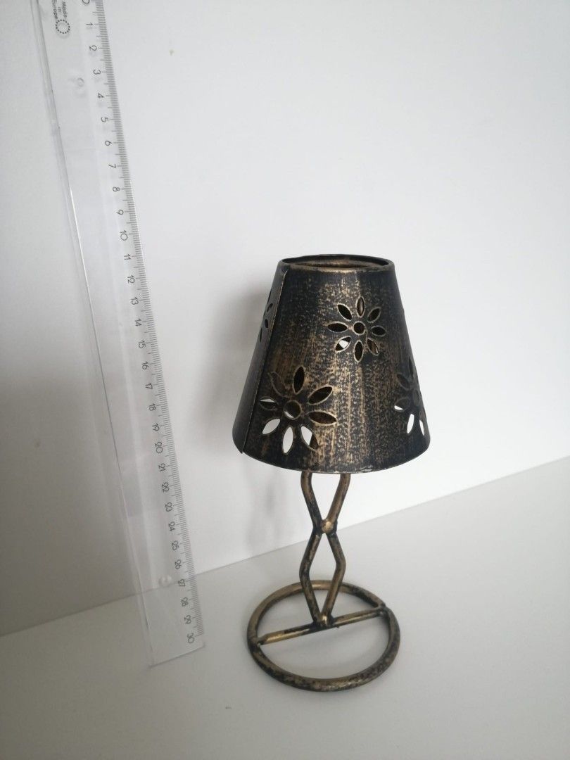 Old candle stand with shade
