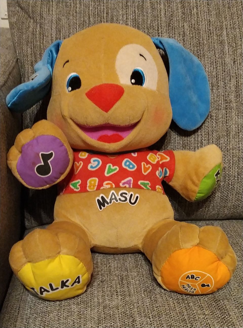 Fisher Price laulava ja jutteleva pehmokoira