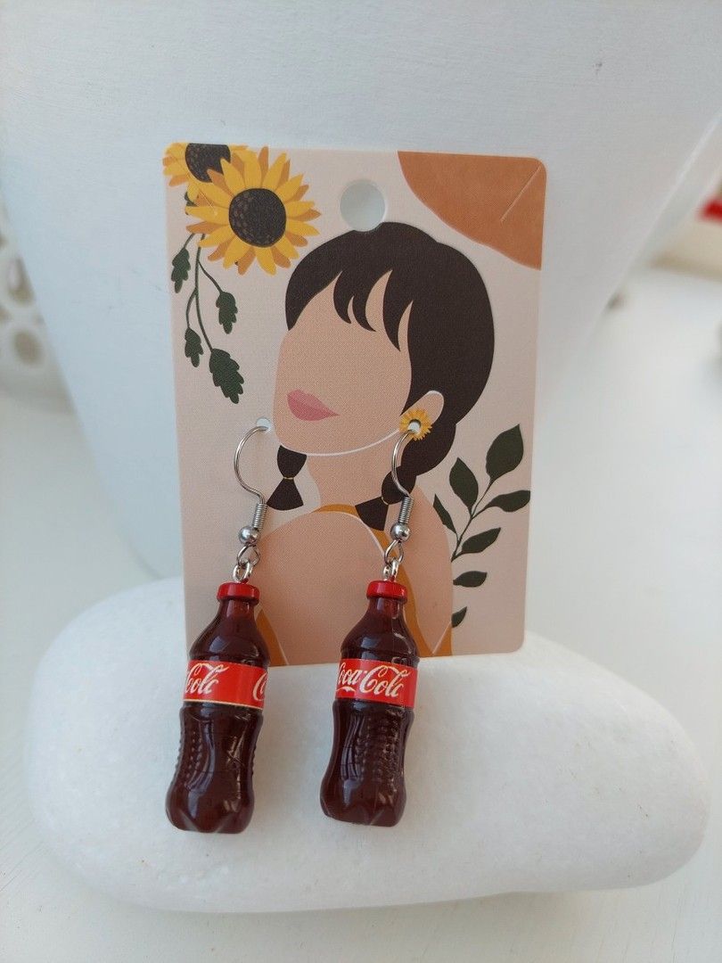 Korvakorut: Coca cola -pullo