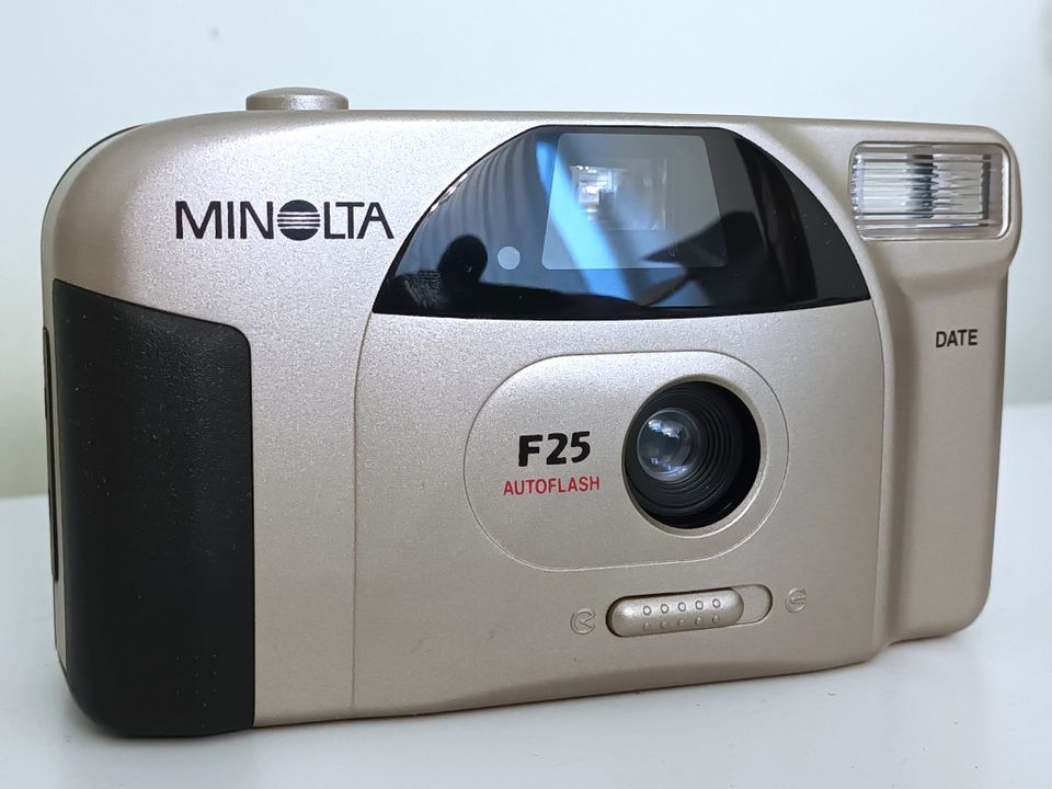 Minolta F25 filmikamera + pakkaus + filmiä
