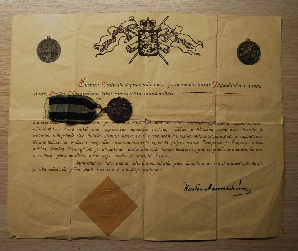Muistomitalin myöntöasiakirja; vapaussodan muistomitali 1918