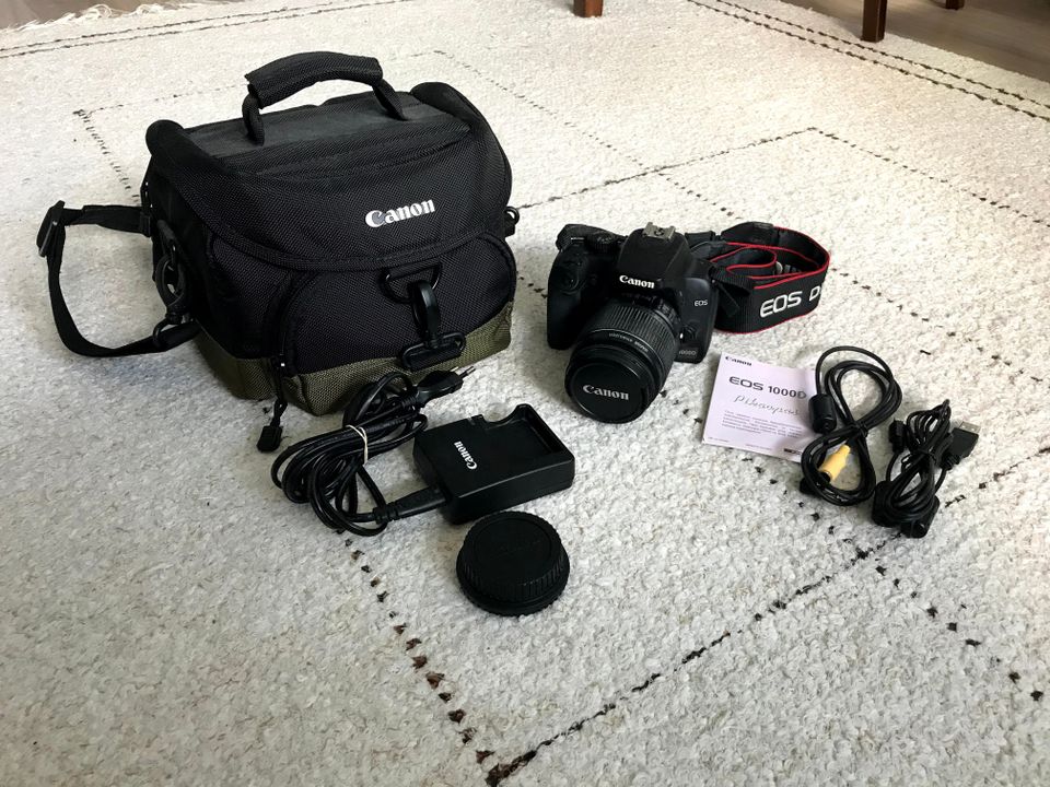 Canon EOS 1000D kamera ja kameralaukku