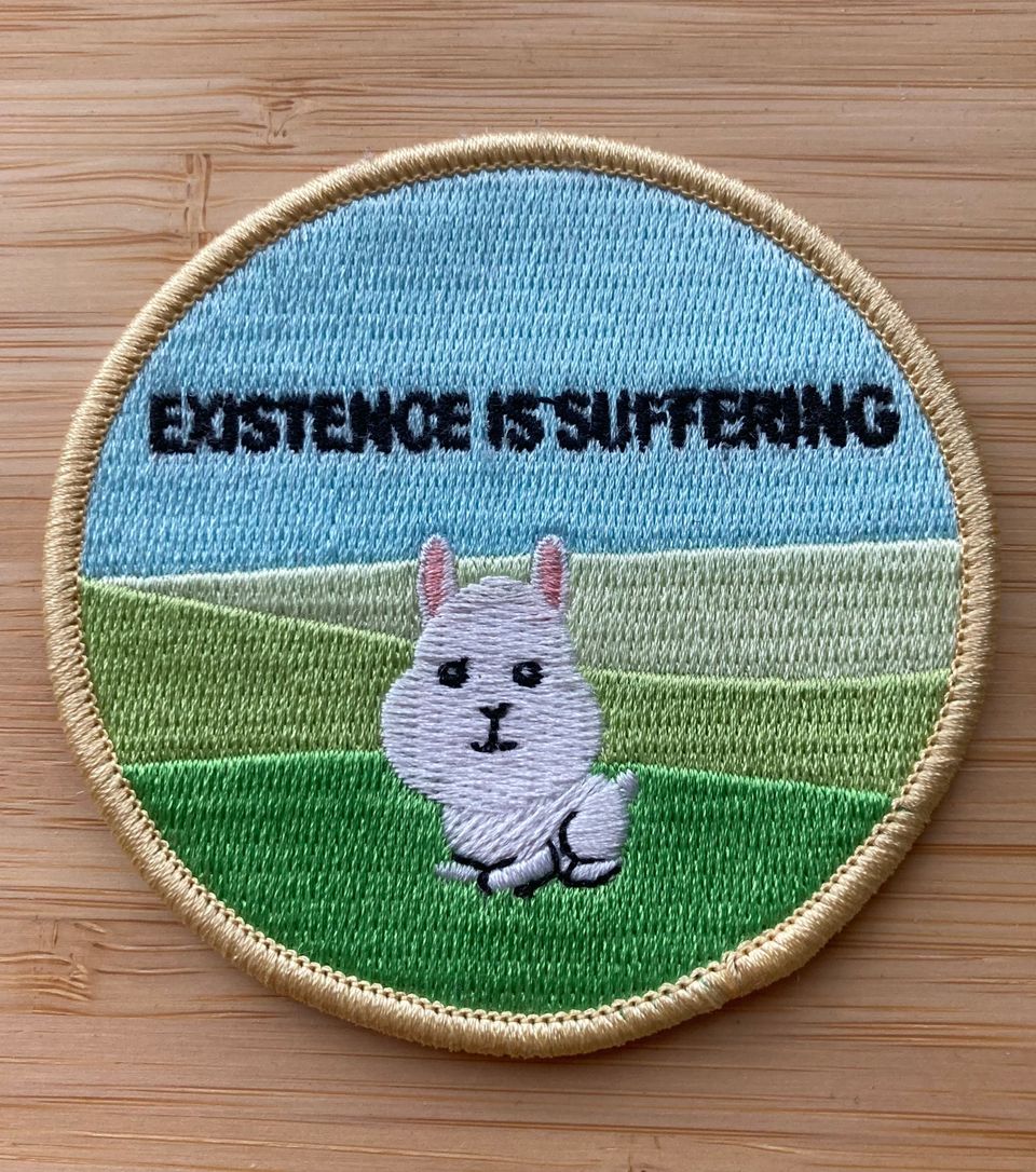 Hihamerkki ”Existence is suffering”