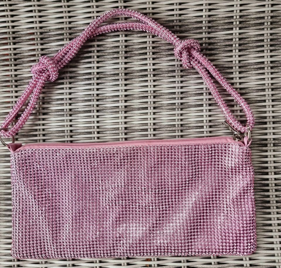 Mascaran pinkki pikkulaukku koristekivillä