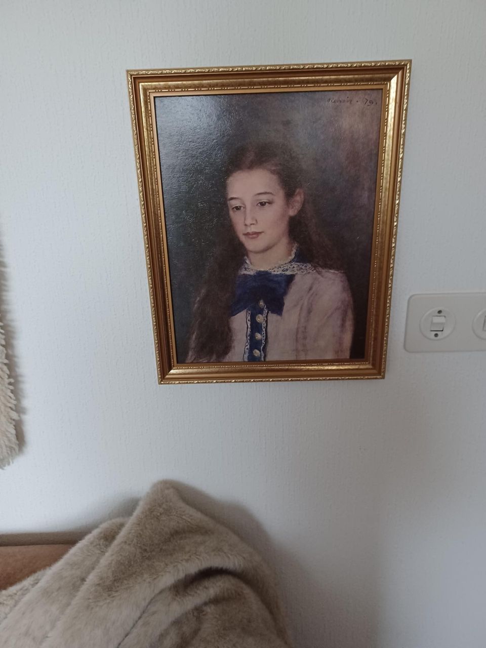 Kehystetty vedos Renoirin tyttö