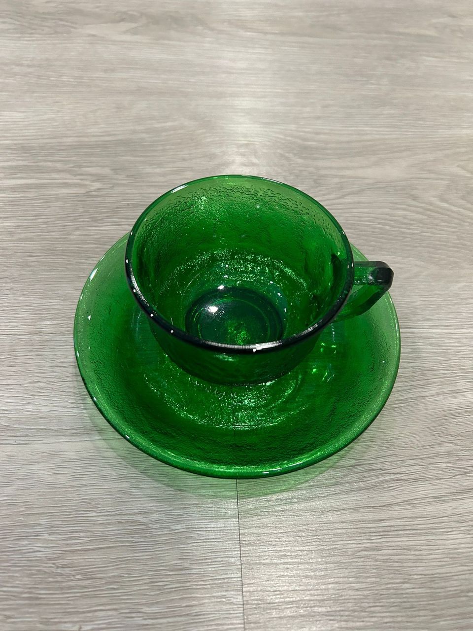 Vihreä kahvikuppi & tasseli