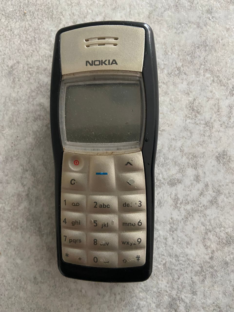 Nokian kännykkä malli:1100 RH-18