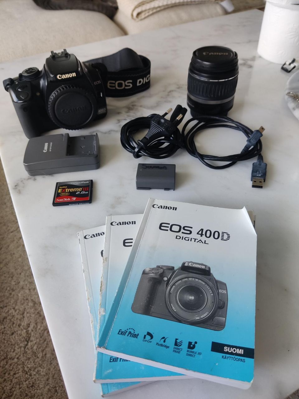 Canon Eos 400D + EFS 18-55mm + muut oheistuotteet