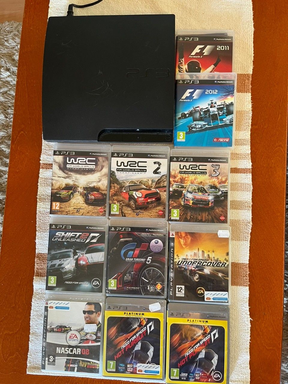 PS3 + 11 autopeliä