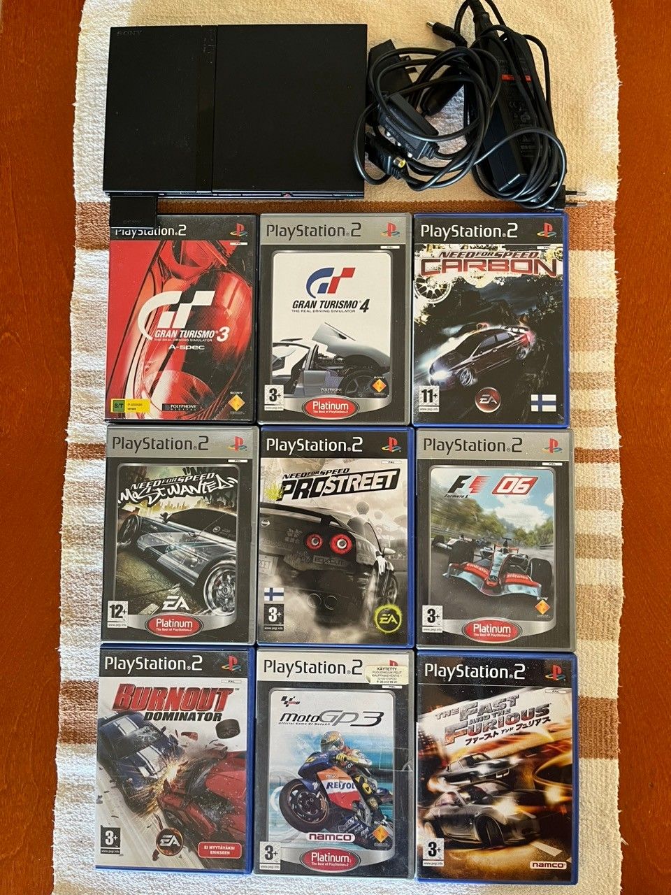 PS2 Slim + 9 autopeliä
