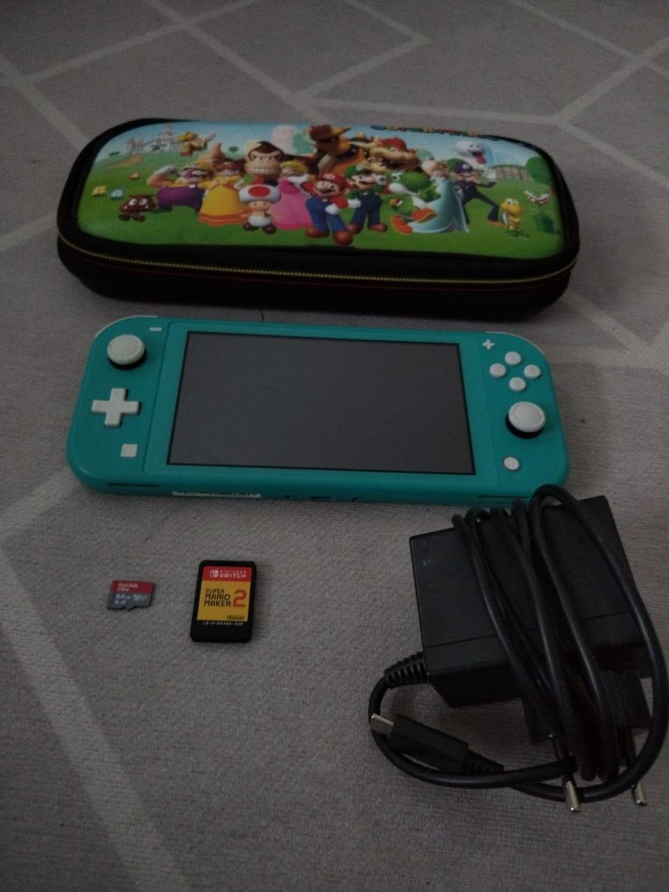 Nintendo switch lite (turkoosi) ja peli